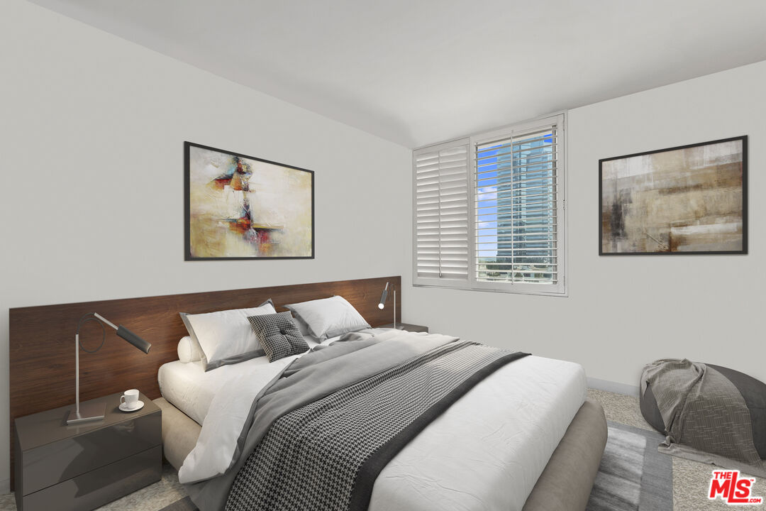 2170 Century Park East, Unit 1507 Los Angeles, CA 90067 - Photo 8 of 17 a bedroom with a bed and a window