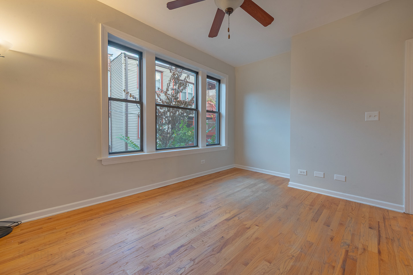 5223 South Drexel Avenue, Unit 2N Chicago, IL 60615 - Photo 17 of 27 wooden floor in an empty room with a window