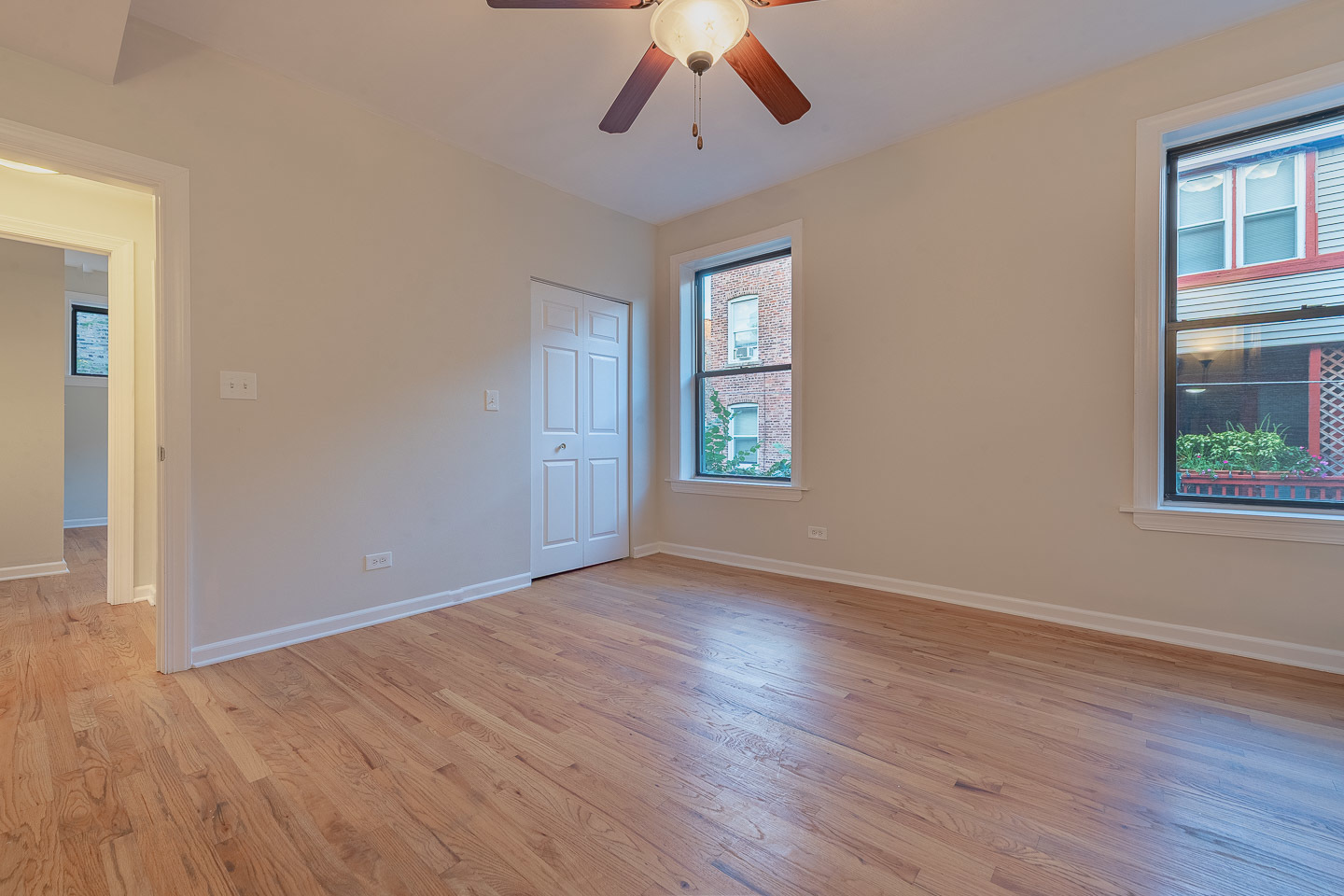 5223 South Drexel Avenue, Unit 2N Chicago, IL 60615 - Photo 20 of 27 wooden floor in an empty room with a window