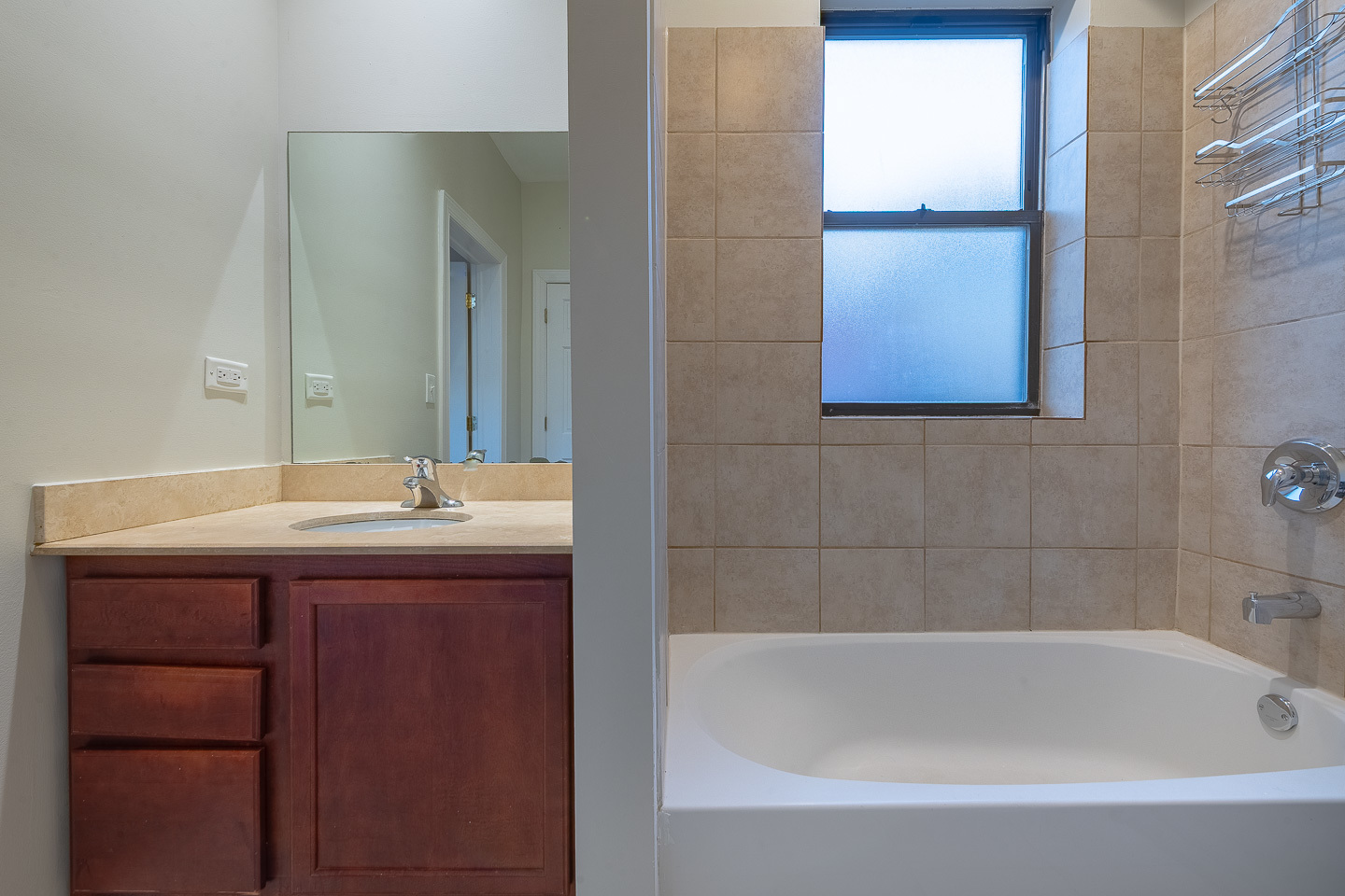 5223 South Drexel Avenue, Unit 2N Chicago, IL 60615 - Photo 25 of 27 a bathroom with a sink and a bathtub