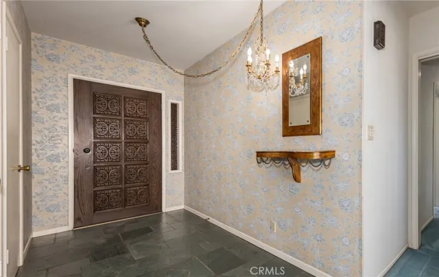 a view of a hallway with windows