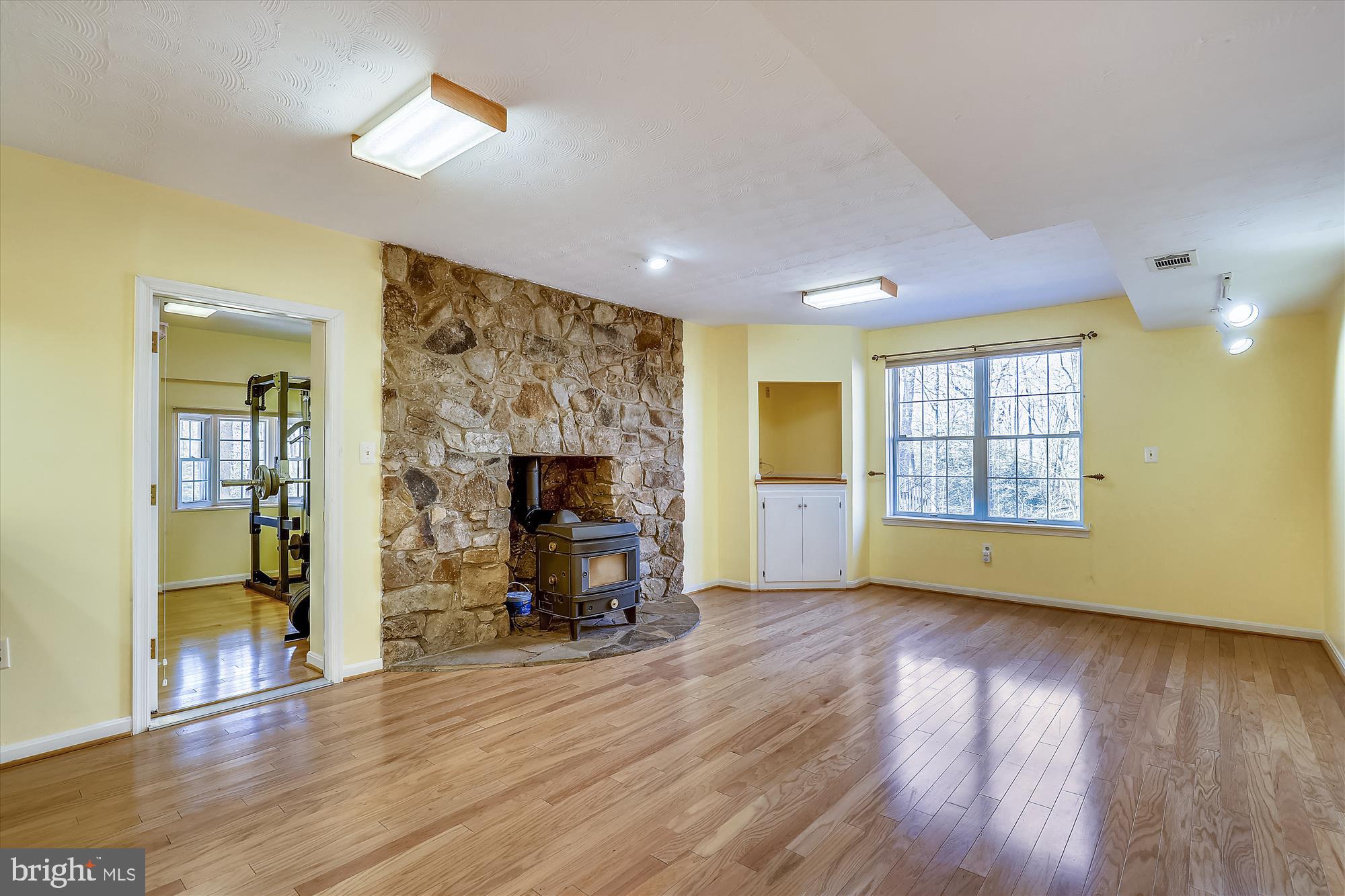 3220 Hickory Ridge Road Dunkirk, MD 20754 - Photo 26 of 39 Finished Basement with Wood Burning Stove