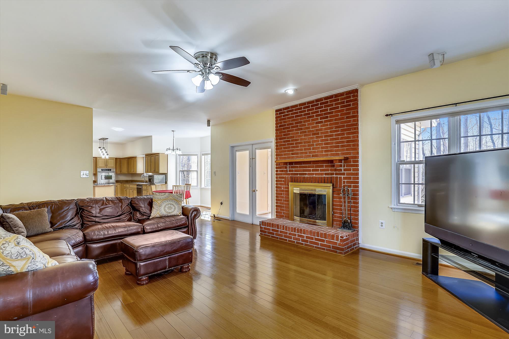 3220 Hickory Ridge Road Dunkirk, MD 20754 - Photo 6 of 39 Living Room w/ Fireplace, Opens to Sunroom & Porch