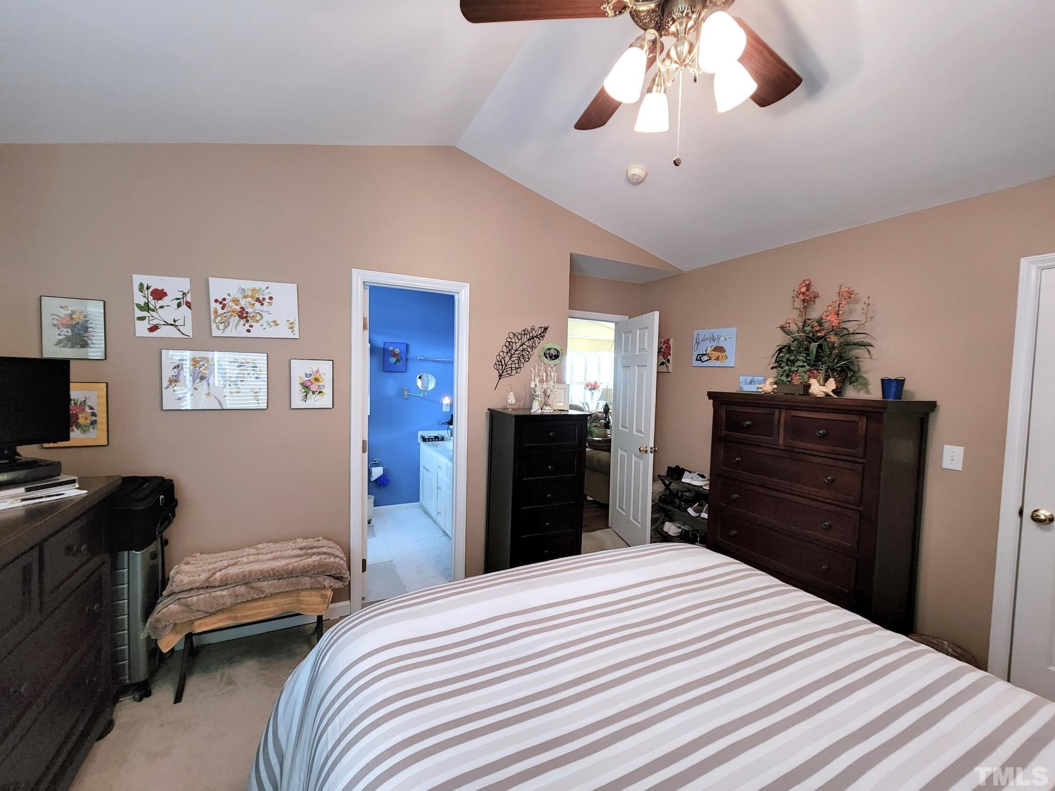 307 Latta Circle Durham, NC 27712 - Photo 19 of 37 a bedroom with a bed and a dresser