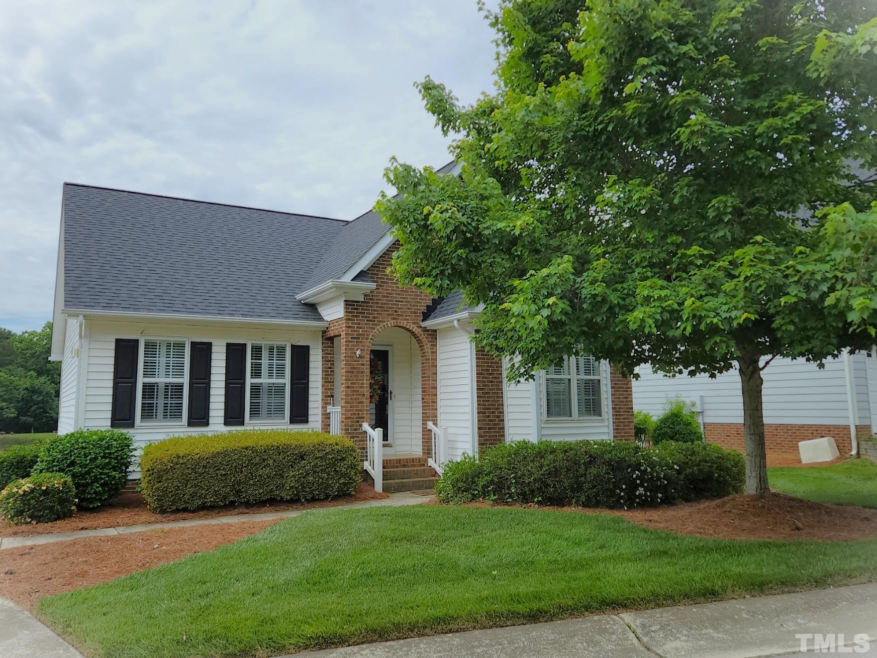 307 Latta Circle Durham, NC 27712 - Photo 2 of 37 a front view of a house with a yard