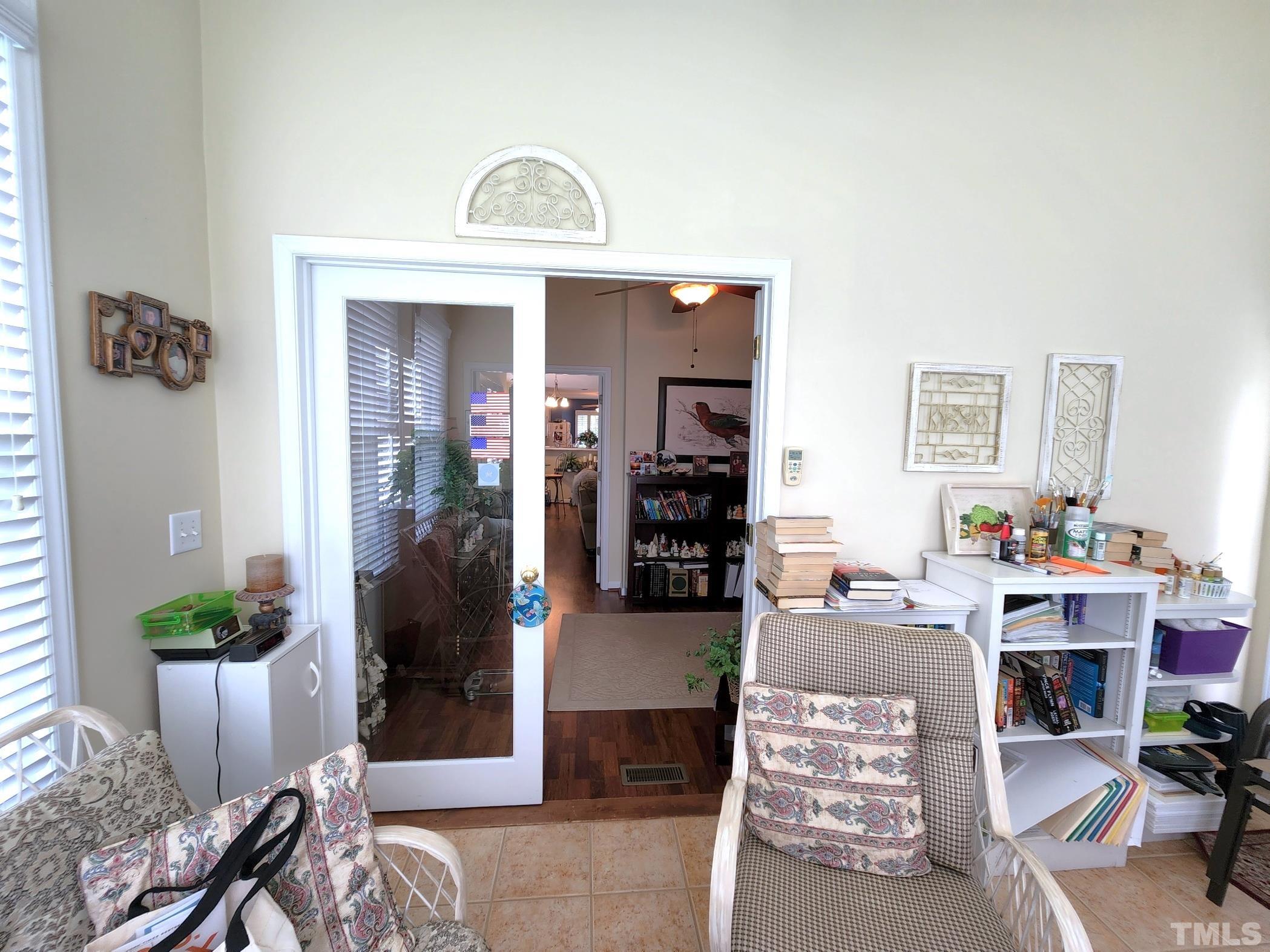 307 Latta Circle Durham, NC 27712 - Photo 27 of 37 a living room with furniture and flowers