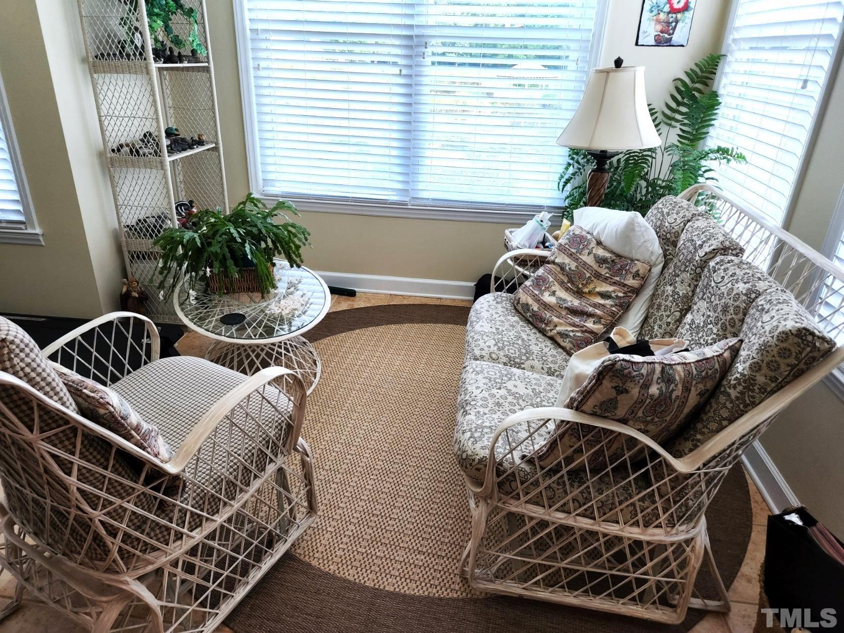 307 Latta Circle Durham, NC 27712 - Photo 29 of 37 a bed room with a bed and a chair
