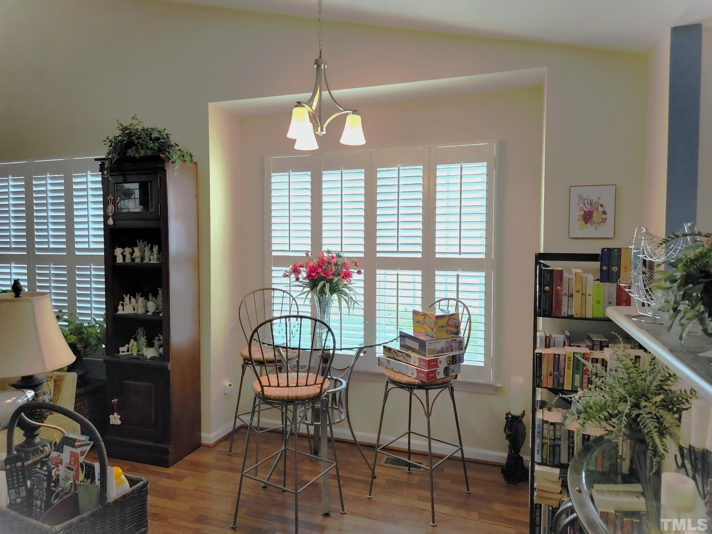 307 Latta Circle Durham, NC 27712 - Photo 10 of 37 a view of a dining room with furniture window and outside view