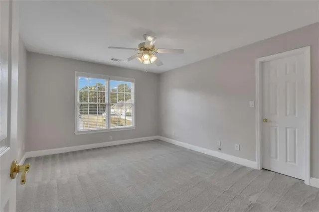 a view of a hallway with seating area