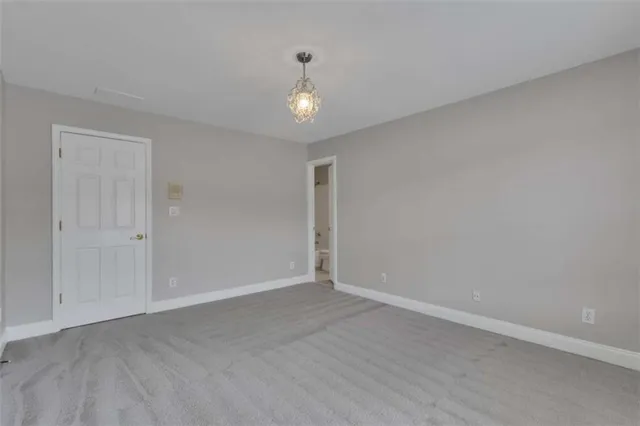 an aerial view of a city with lots of residential buildings