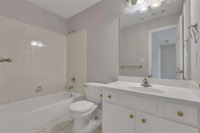 an aerial view of a house with outdoor space