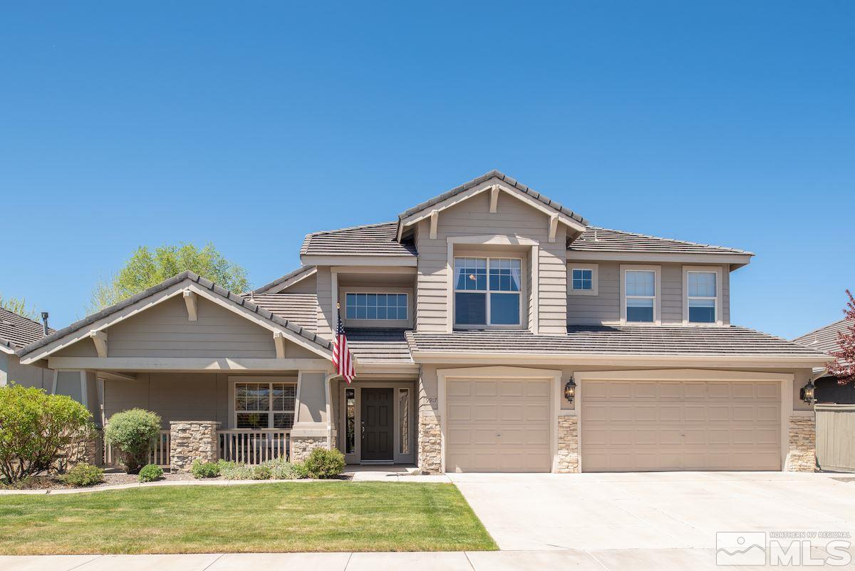 9917 Rio Bravo Drive Reno, NV 89521 - Photo 1 of 36 a front view of a house with garden
