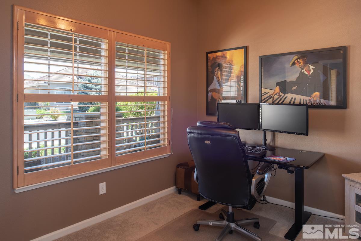 9917 Rio Bravo Drive Reno, NV 89521 - Photo 17 of 36 a view of a workspace with furniture and a window