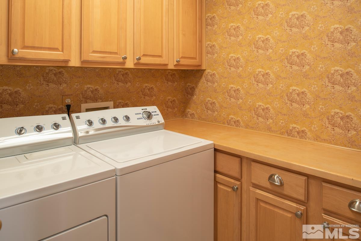 9917 Rio Bravo Drive Reno, NV 89521 - Photo 19 of 36 a utility room with dryer and washer