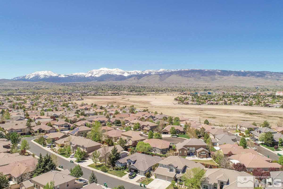 9917 Rio Bravo Drive Reno, NV 89521 - Photo 29 of 36 an aerial view of residential building with outdoor space and trees