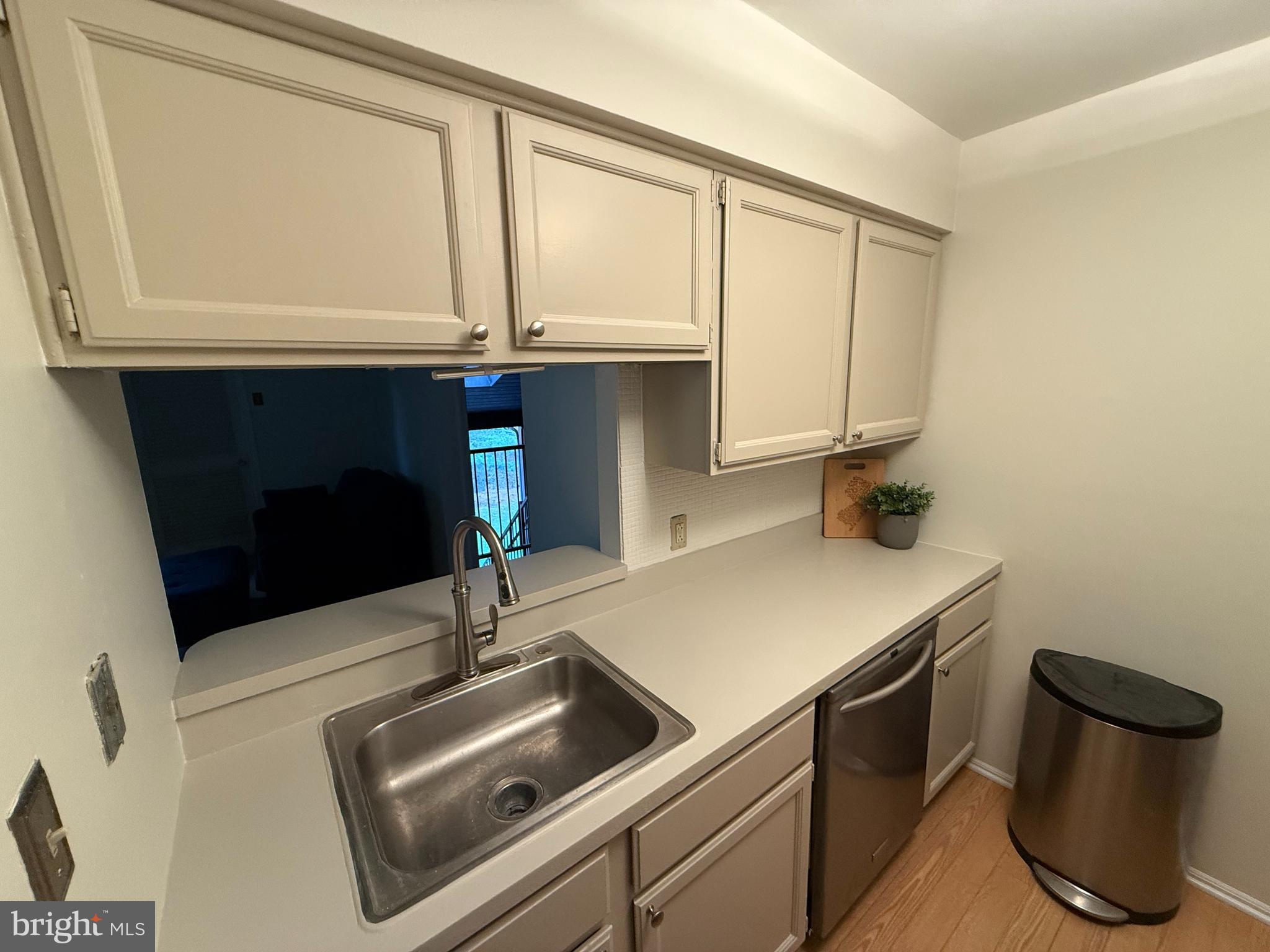 36 Gena Court Hamilton, NJ 08690 - Photo 4 of 15 a kitchen with a sink and a stove