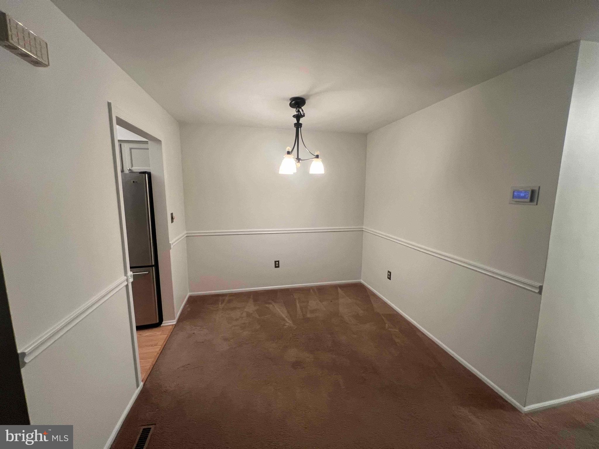 36 Gena Court Hamilton, NJ 08690 - Photo 6 of 15 a view of empty room with wooden floor