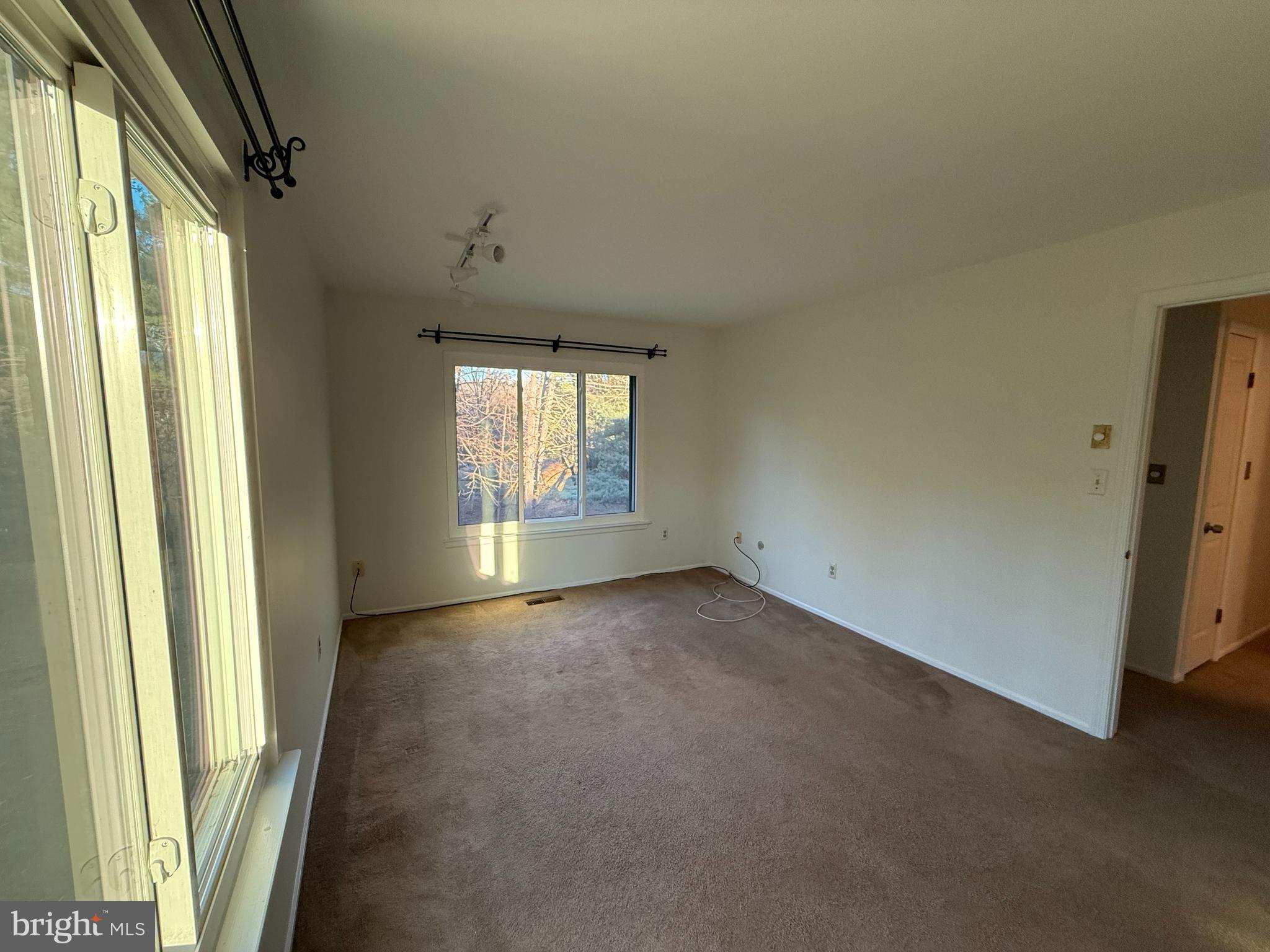 36 Gena Court Hamilton, NJ 08690 - Photo 9 of 15 a view of an empty room with a window