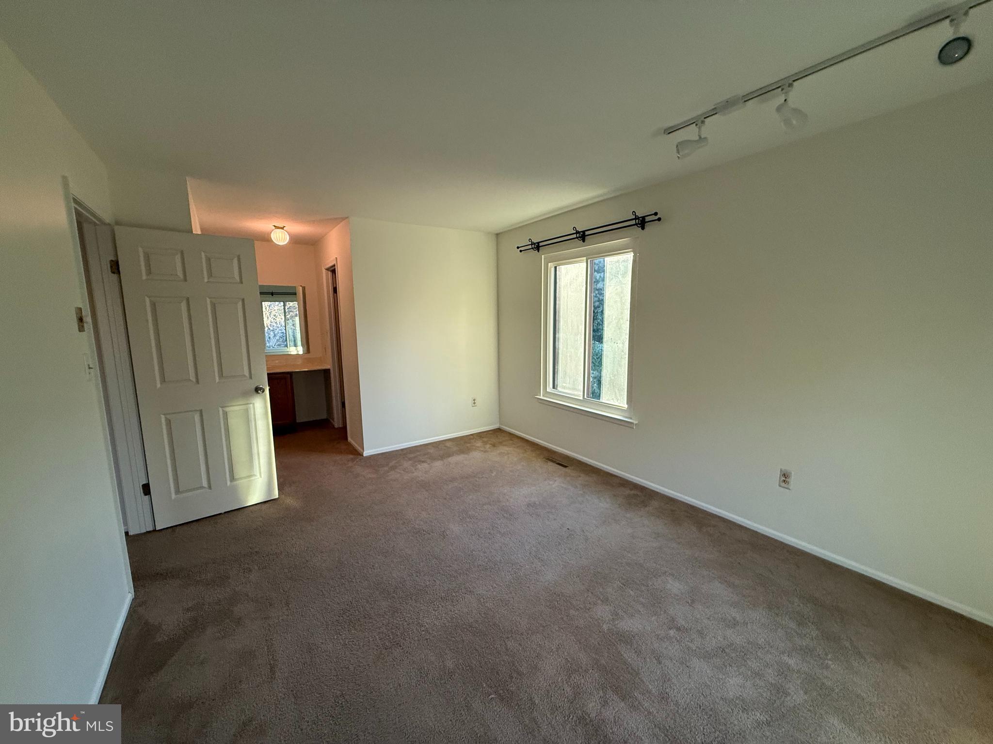 36 Gena Court Hamilton, NJ 08690 - Photo 10 of 15 an empty room with windows and entrance
