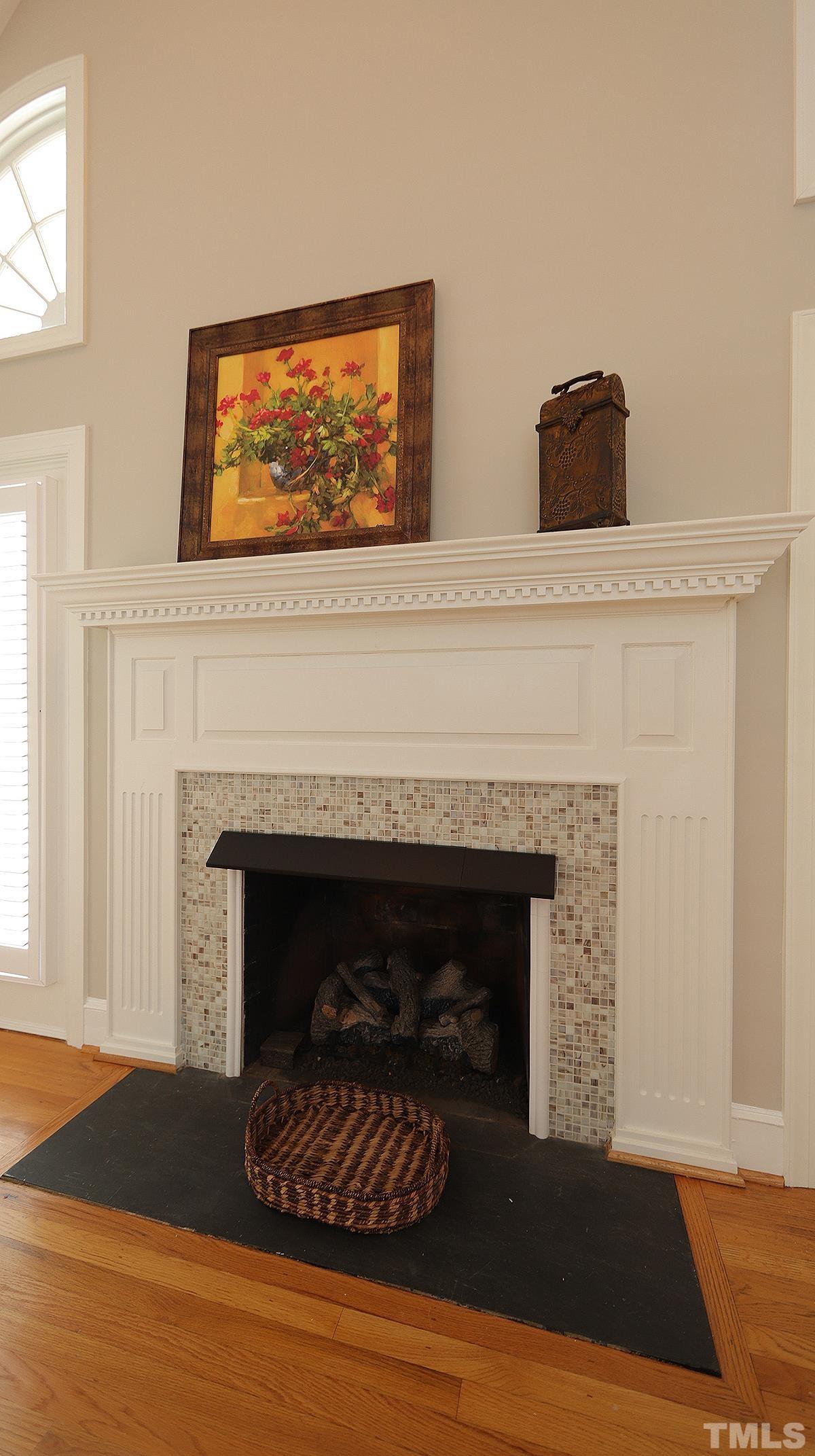 2208 Middlefield Court Raleigh, NC 27615 - Photo 8 of 34 a living room with a fireplace