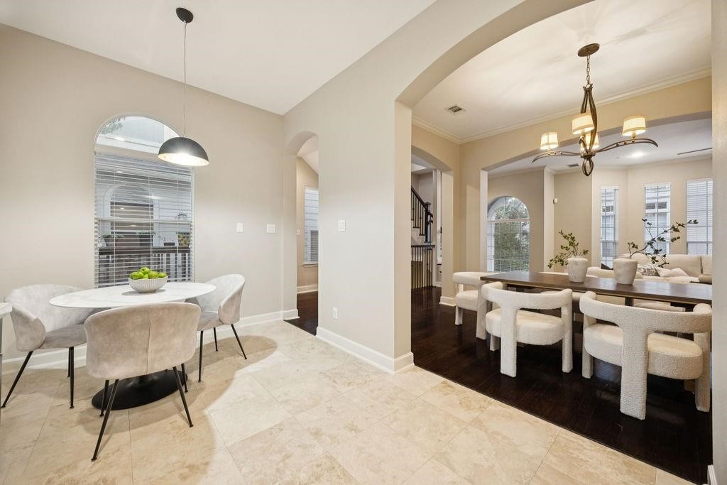 5407 Lillian Street Houston, TX 77007 - Photo 15 of 38 a room with lots of white furniture a window and appliances