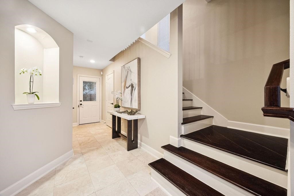 5407 Lillian Street Houston, TX 77007 - Photo 5 of 38 a view of a livingroom with furniture and staircase