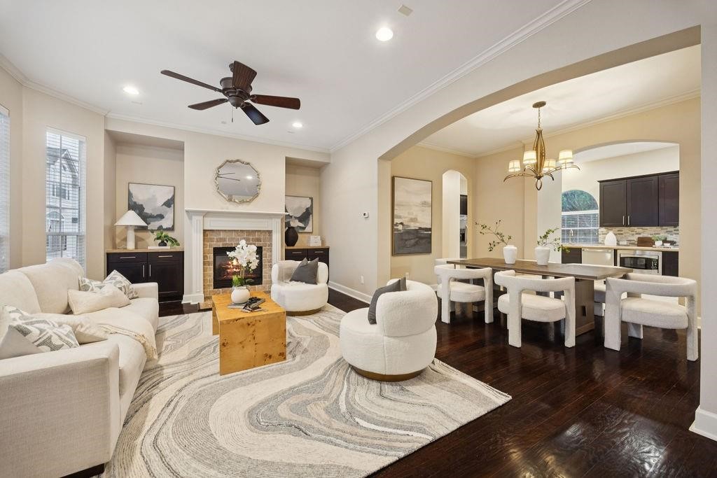 5407 Lillian Street Houston, TX 77007 - Photo 6 of 38 a living room with fireplace furniture and a large window