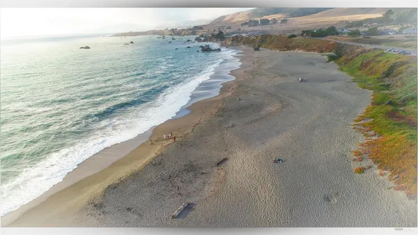 a view of beach and ocean