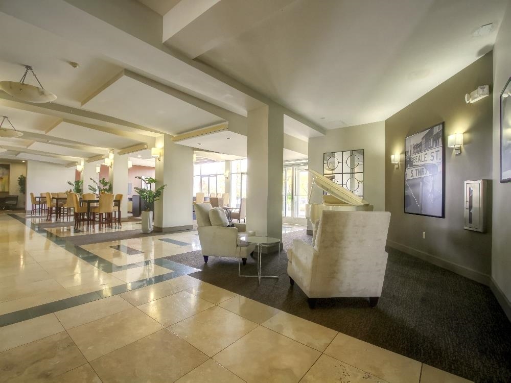 655 Riverside Drive, Unit 805A Memphis, TN 38103 - Photo 23 of 25 a view of a living room and dining room