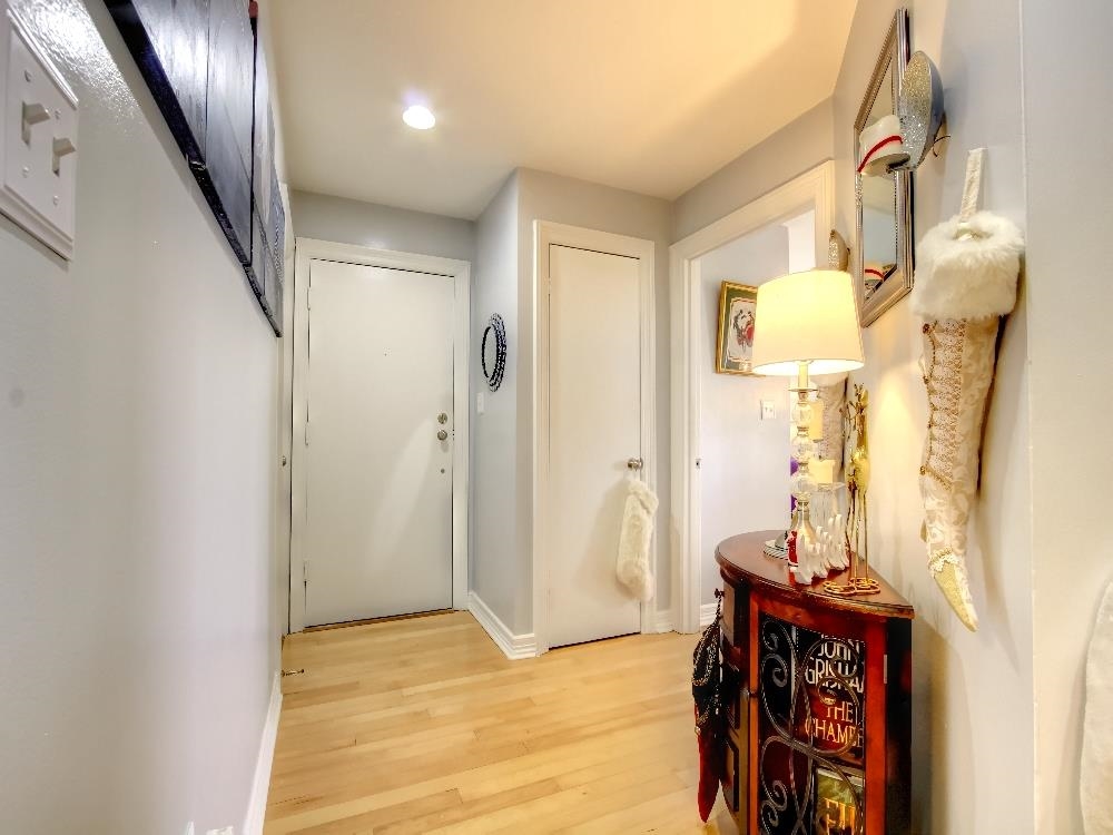 655 Riverside Drive, Unit 805A Memphis, TN 38103 - Photo 10 of 25 a view of an entryway with wooden floor