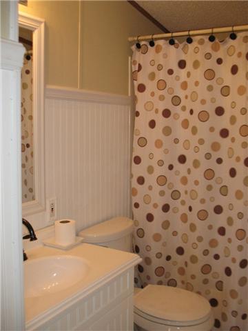 3174 Beckwith Road Mount Juliet, TN 37122 - Photo 12 of 15 a bathroom with a sink toilet and shower