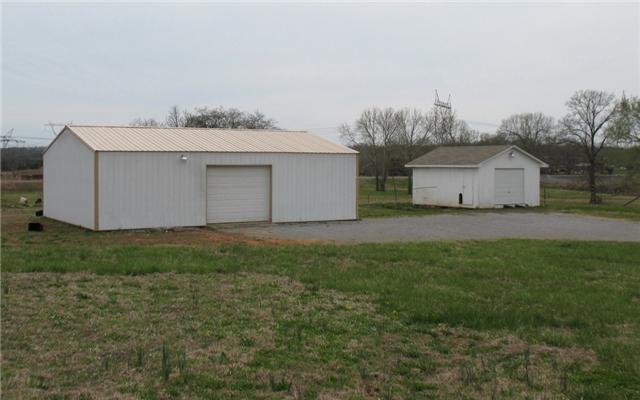 3174 Beckwith Road Mount Juliet, TN 37122 - Photo 13 of 15 a view of a barn in the middle of a yard
