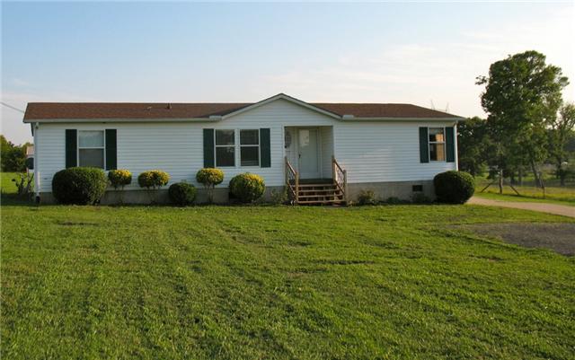 3174 Beckwith Road Mount Juliet, TN 37122 - Photo 2 of 15 a front view of a house with a garden