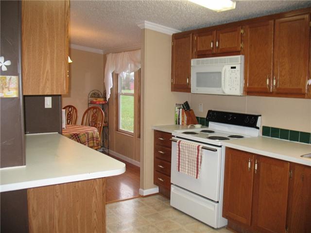 3174 Beckwith Road Mount Juliet, TN 37122 - Photo 5 of 15 a kitchen that has a sink and a stove in it
