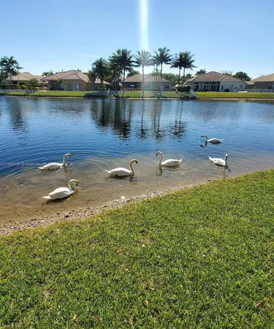a view of a lake with houses