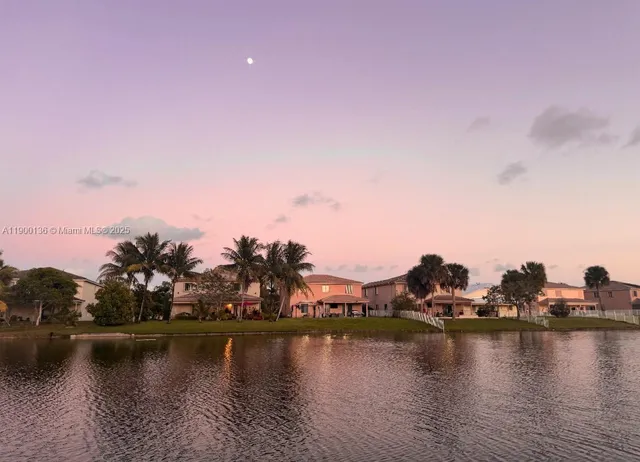 a view of a lake with houses