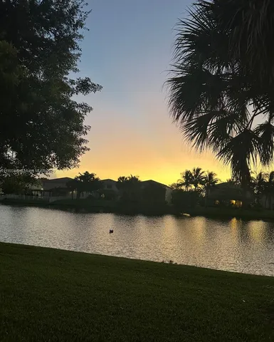 a view of outside space with a lake view