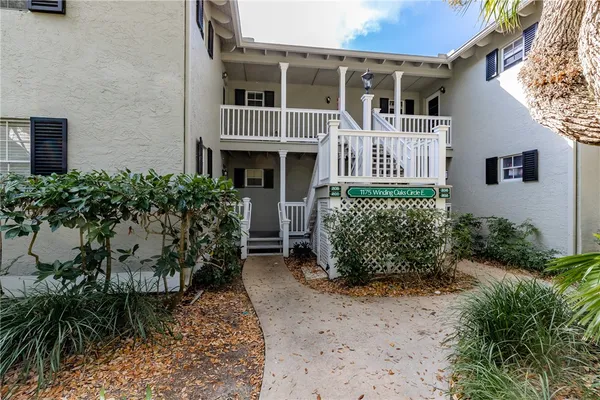 a house view with a garden space