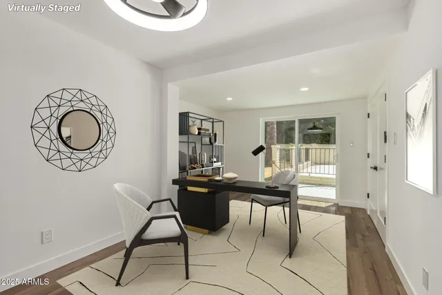 a view of a workspace with furniture