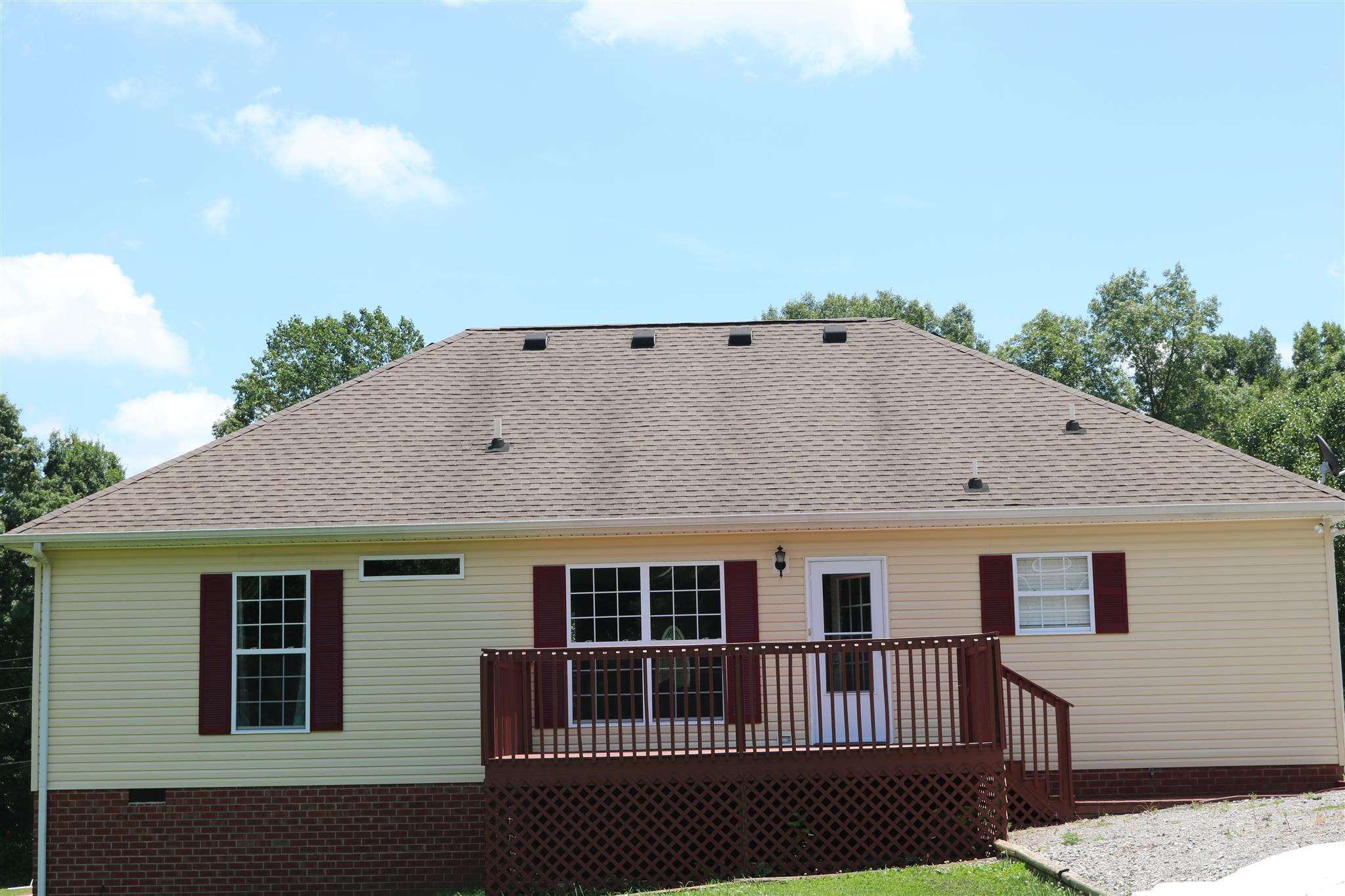 1525 Rapids Road Portland, TN 37148 - Photo 2 of 14 a view of a house with a balcony