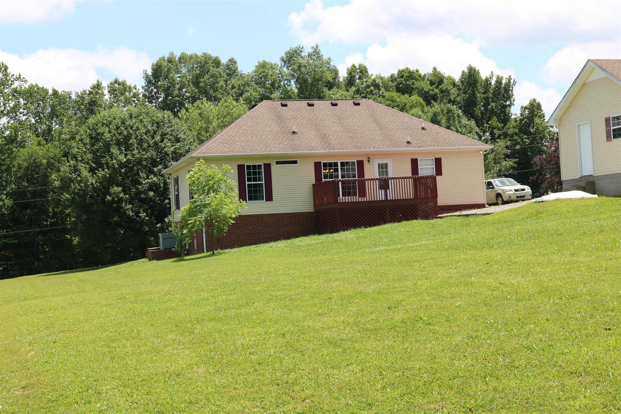 1525 Rapids Road Portland, TN 37148 - Photo 14 of 14 a house view with a garden space