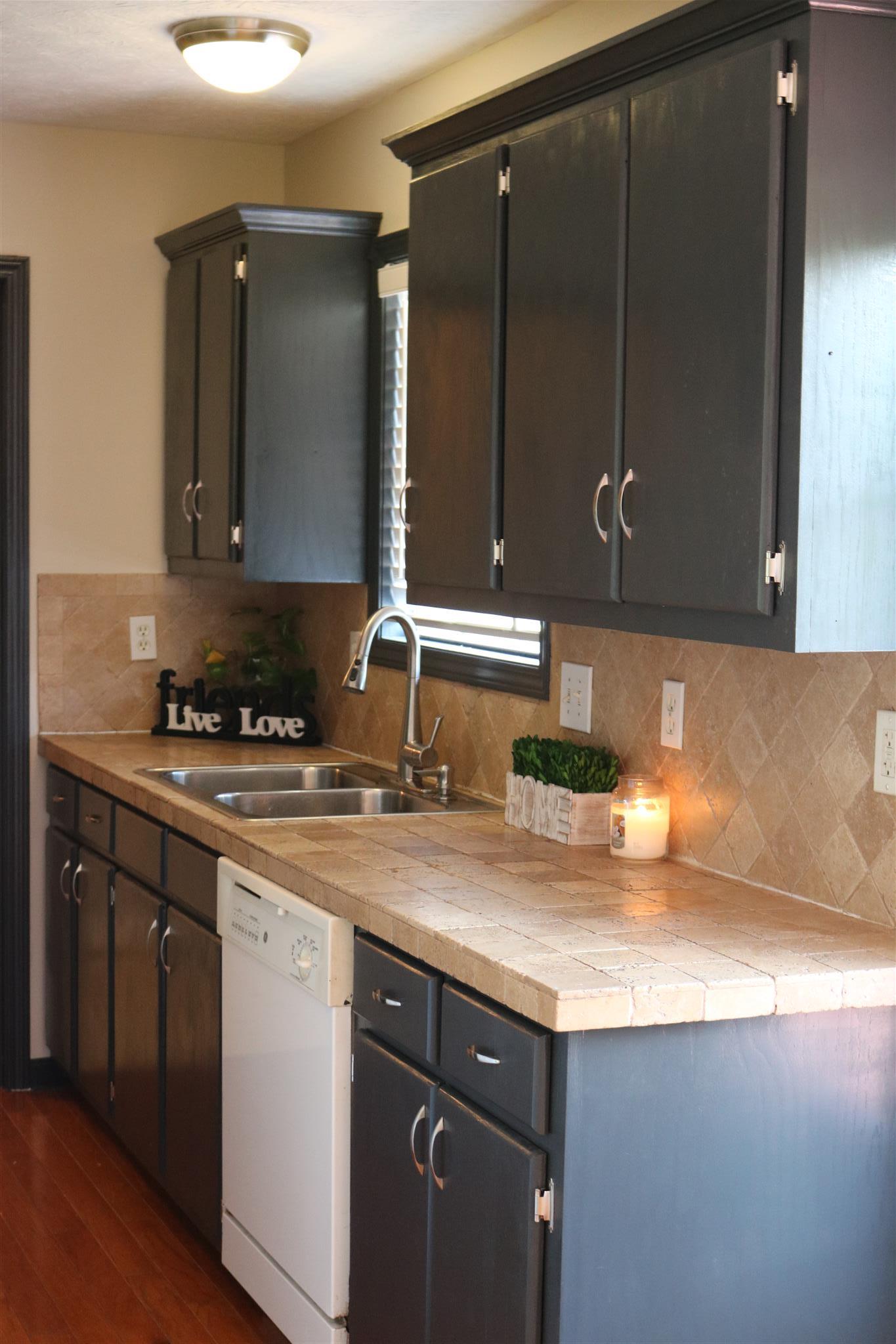 1525 Rapids Road Portland, TN 37148 - Photo 7 of 14 a kitchen with a sink and cabinets