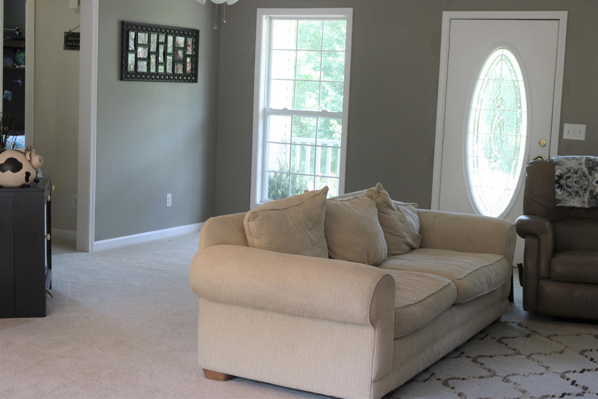 1525 Rapids Road Portland, TN 37148 - Photo 9 of 14 a living room with furniture and a window