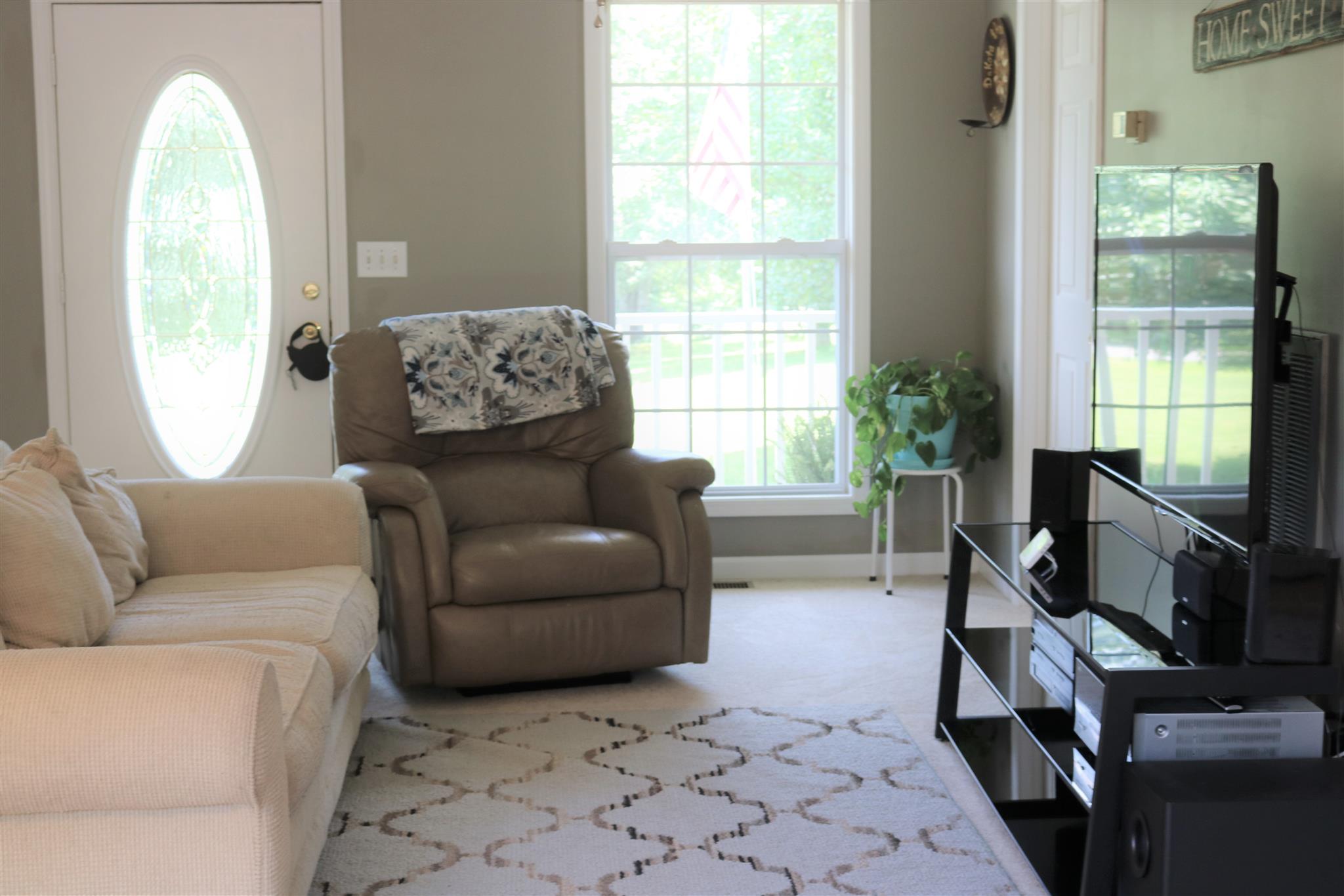 1525 Rapids Road Portland, TN 37148 - Photo 10 of 14 a living room with furniture and a window