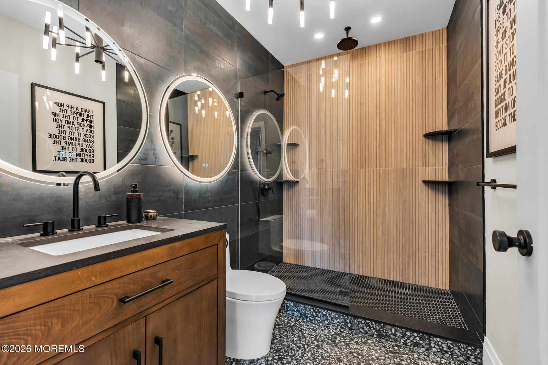 459 Boca Raton Drive Lavallette, NJ 08735 - Photo 28 of 73 a bathroom with a toilet sink and mirror
