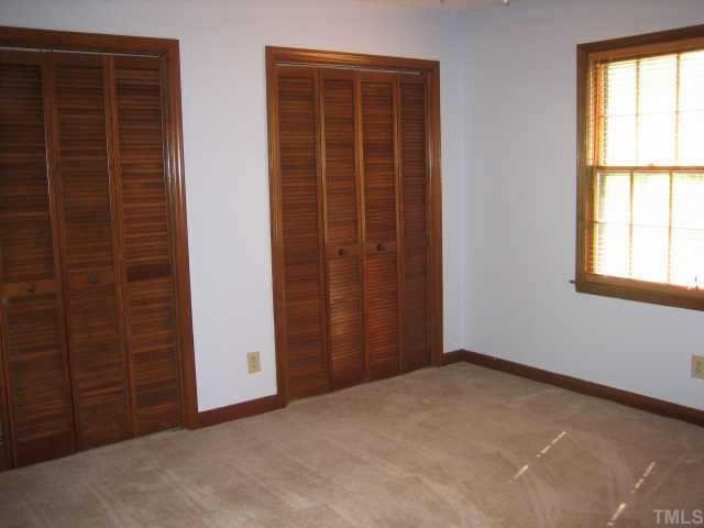 7409 Thorn Ridge Road Raleigh, NC 27613 - Photo 7 of 7 Both secondary bedrooms have double closets. Other