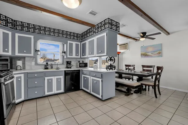 a view of a dining room with furniture