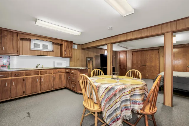 a kitchen with stainless steel appliances granite countertop a sink and cabinets