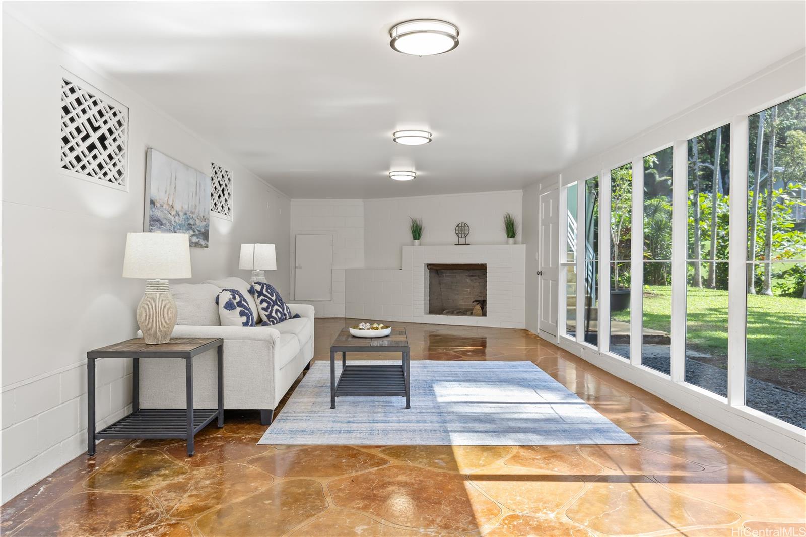 19 Hinalo Place Honolulu, HI 96817 - Photo 20 of 25 a living room with furniture rug and a fireplace