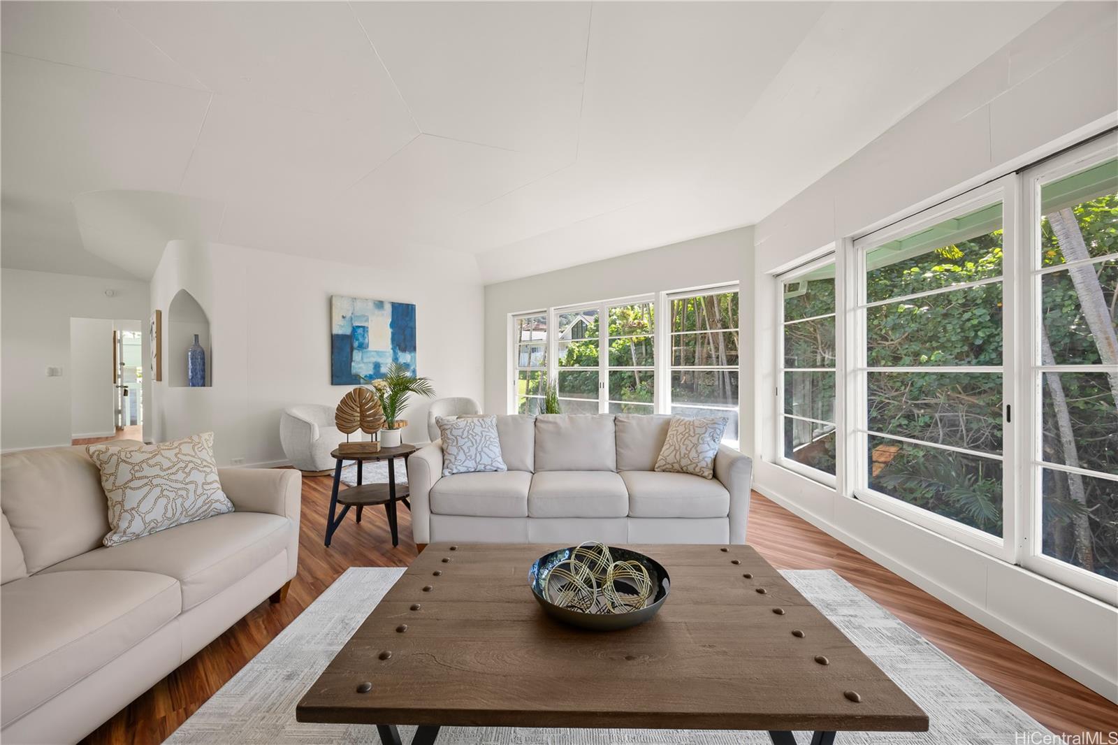 19 Hinalo Place Honolulu, HI 96817 - Photo 3 of 25 a living room with furniture and a large window